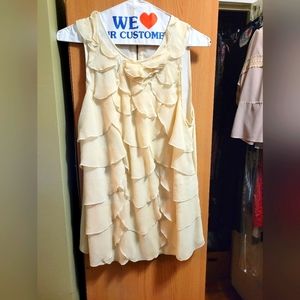 Ruffled sleeveless tunic top